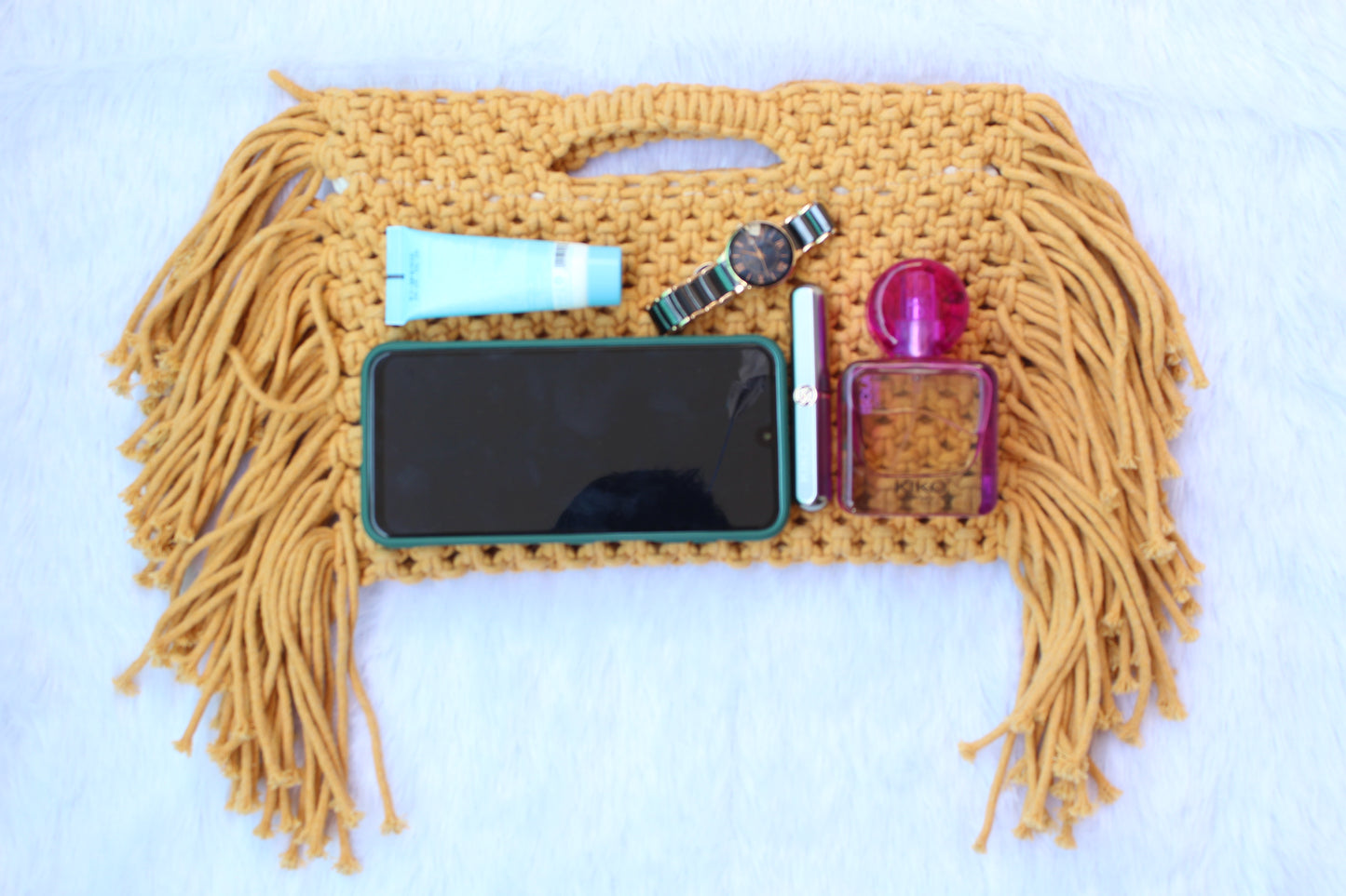 Handcrafted macrame clutch